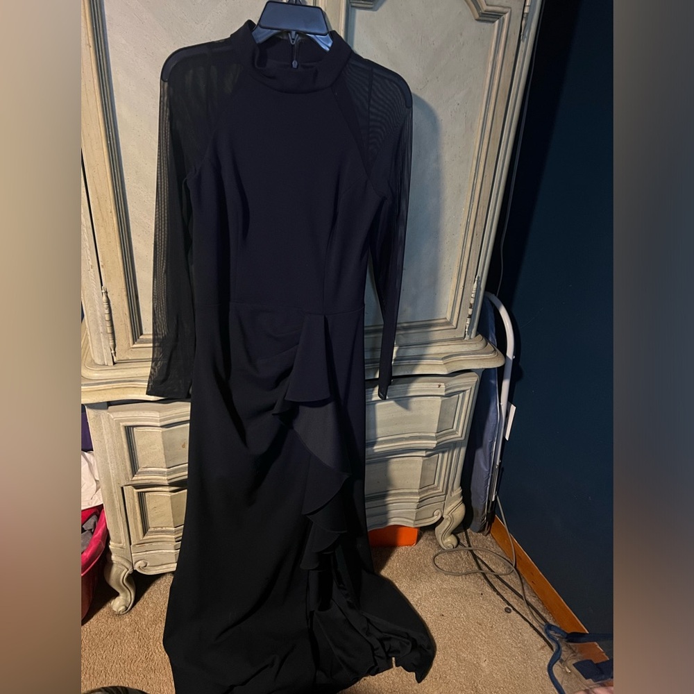 Navy blue long sleeve gown by Betsy Adams